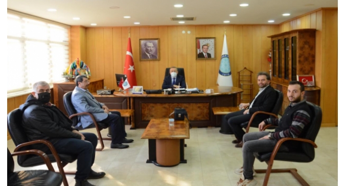 İMH Bursa'dan BUÜ Rektörü Kılavuz'a ziyareti